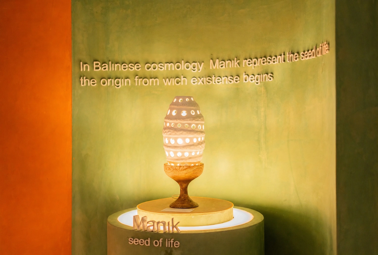 Glowing Manik seed of life ceramic lamp on pedestal