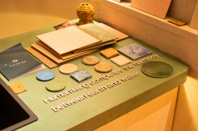 Material samples on green counter with text
