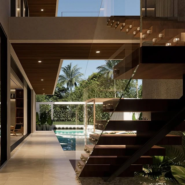 Modern swimming pool with lights at dusk