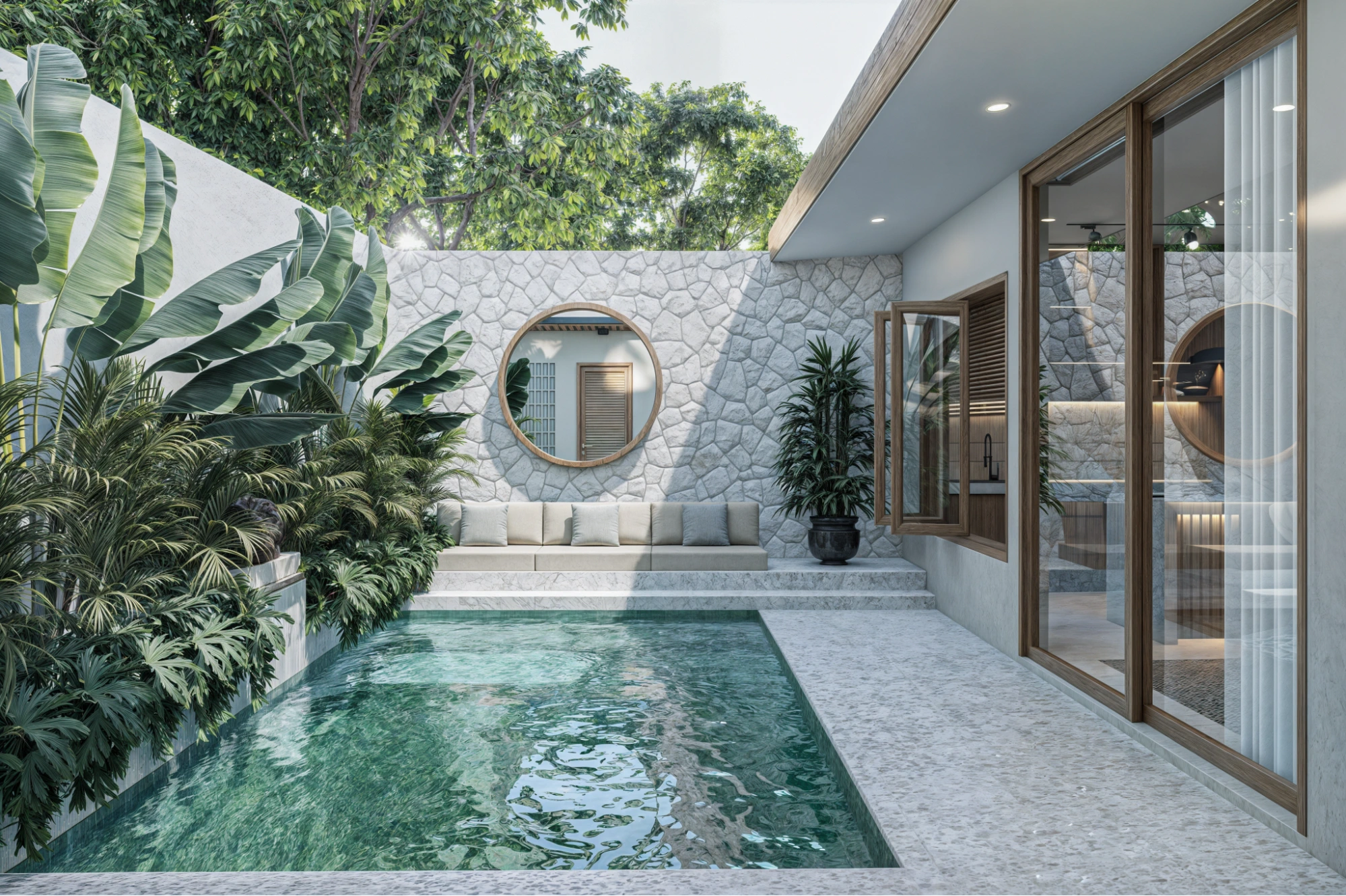 modern tropical pool with stone wall and sofa