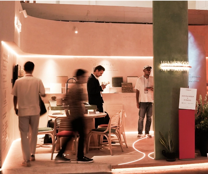 People walking past Altarize interior design booth