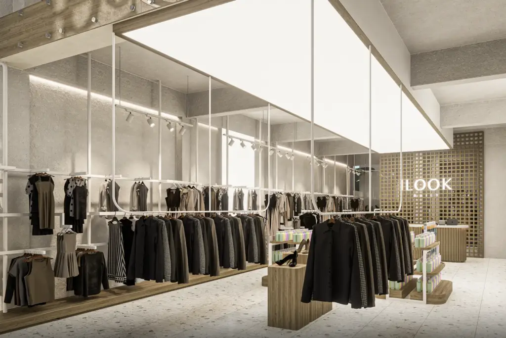 Fashion display area with white finishes and warm wood accents at I Look Daily Gianyar