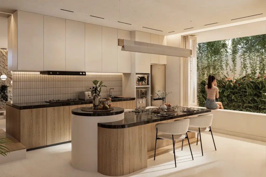 Open kitchen and dining space with tropical garden connection at Babakan Villa
