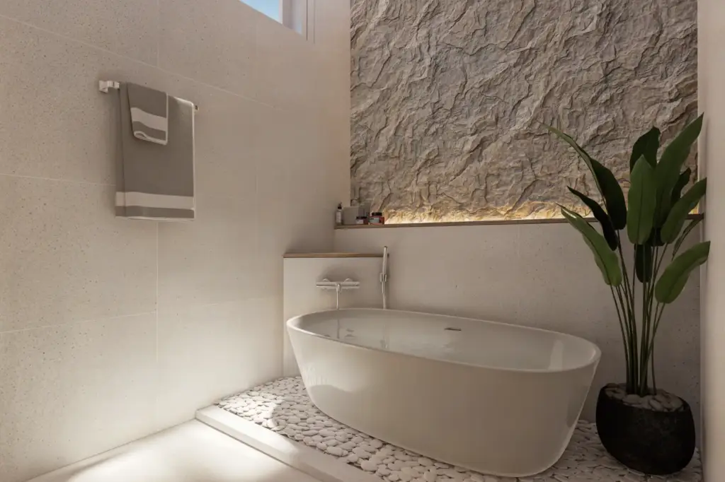 shower area and bathub with warm natural materials at Babakan Villa in Bali