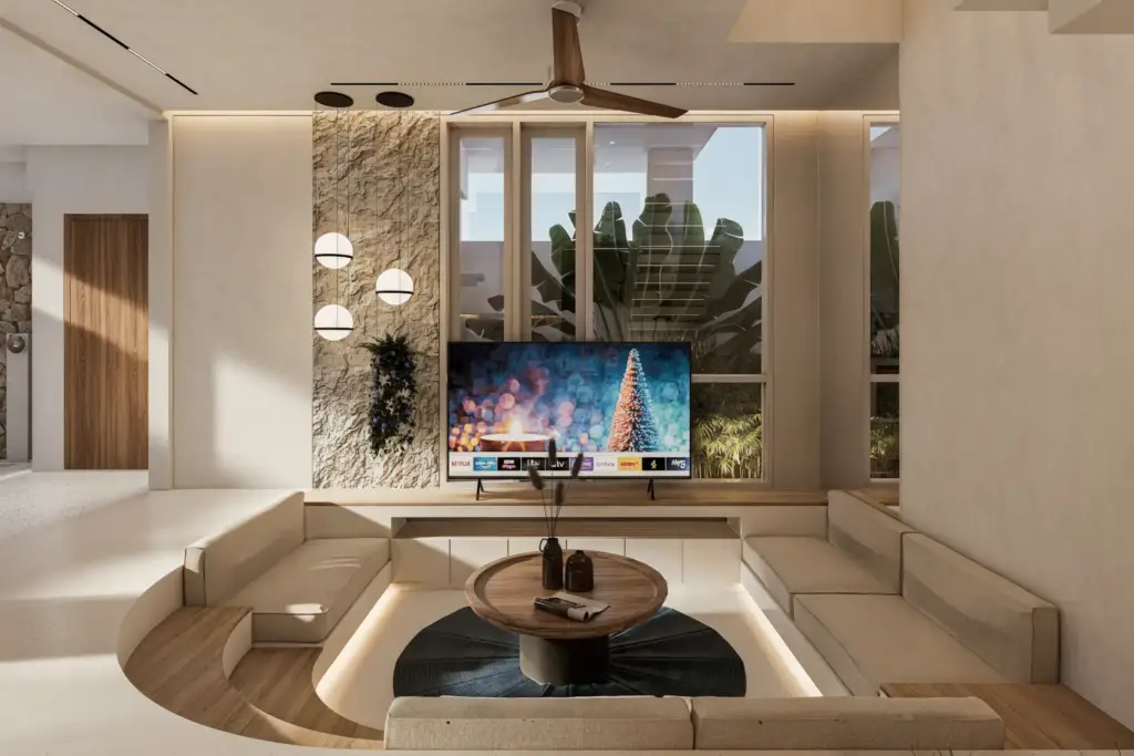 Sunken living area with natural materials at Babakan Villa in Bali