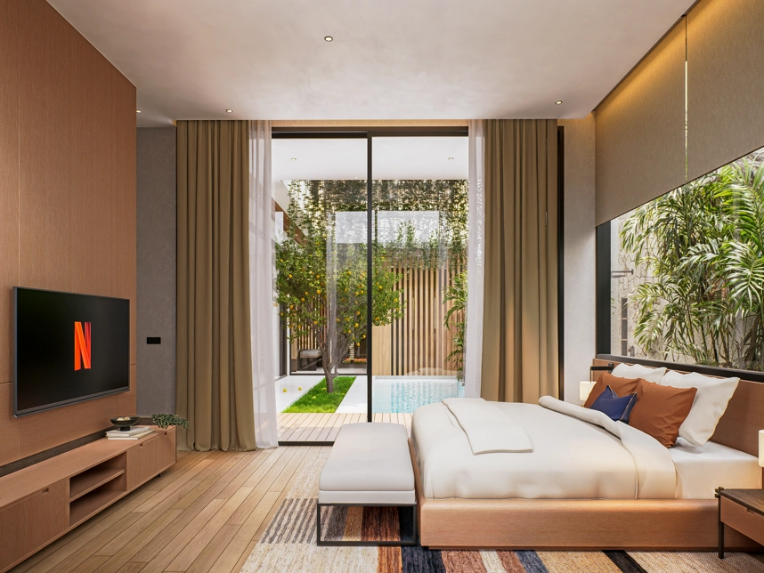 Modern bedroom with TV and view of outdoor pool